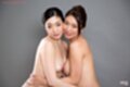 Breasts pressed together